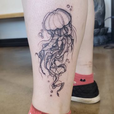 sketch style delicate jellyfish tattoo