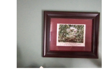 Cross-stitched picture of Jesus walking with a lamb in The Garden of Eden.