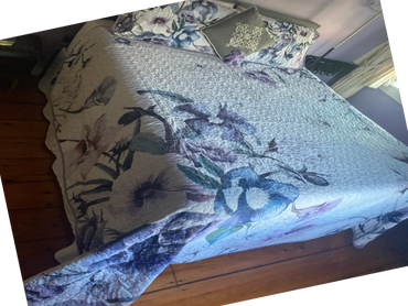 From the bathroom entrance, the Queen bed beckons you to rest.