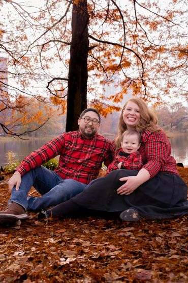 Imagine the soft rustle of leaves and the crisp air of a fall afternoon. As you take in this image, reflect on the importance of family and the simple joy of a moment captured in time