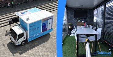 Carro oficina de Publisual con interior habilitado como sala de reuniones, con mesa y sillas.