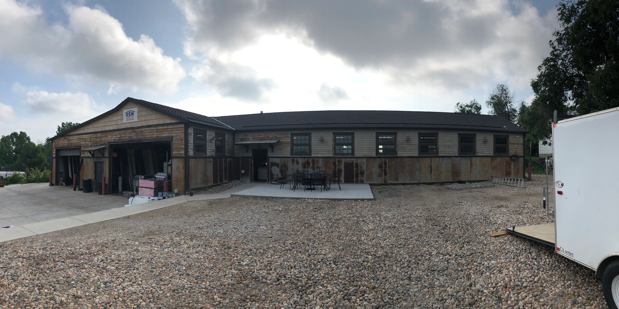 afordable roofing building front before