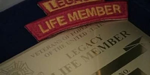 Legacy Life Member patches and certificate for Vietnam veterans.