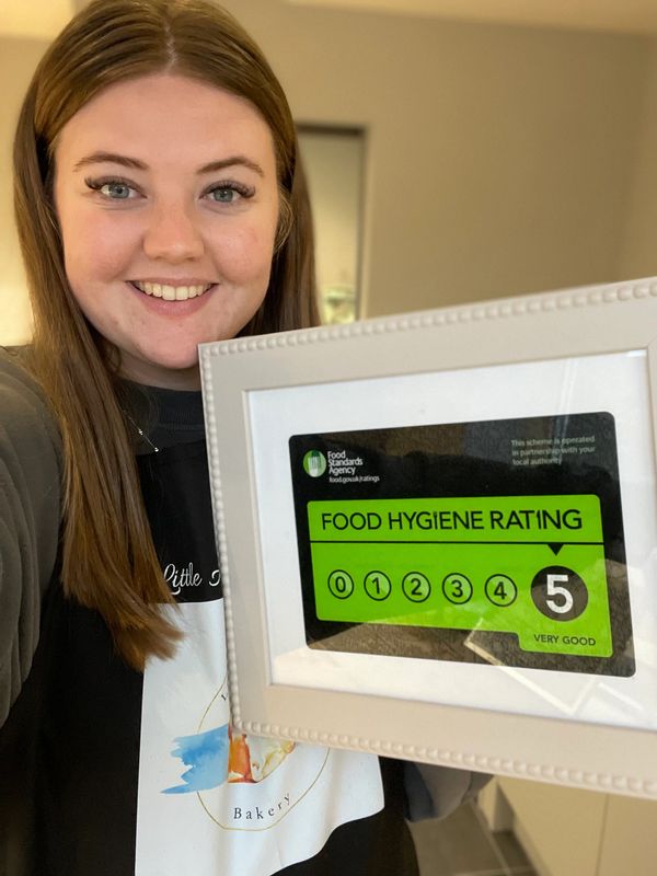 Ebony showing our 5 star Food Hygiene Rating 