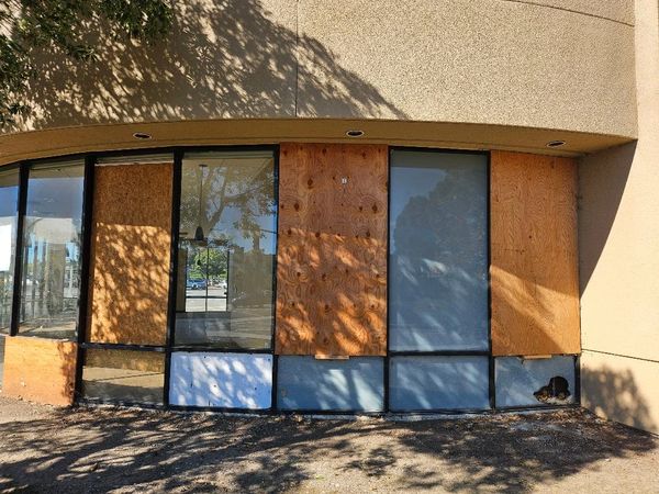 Multiple windows boarded up