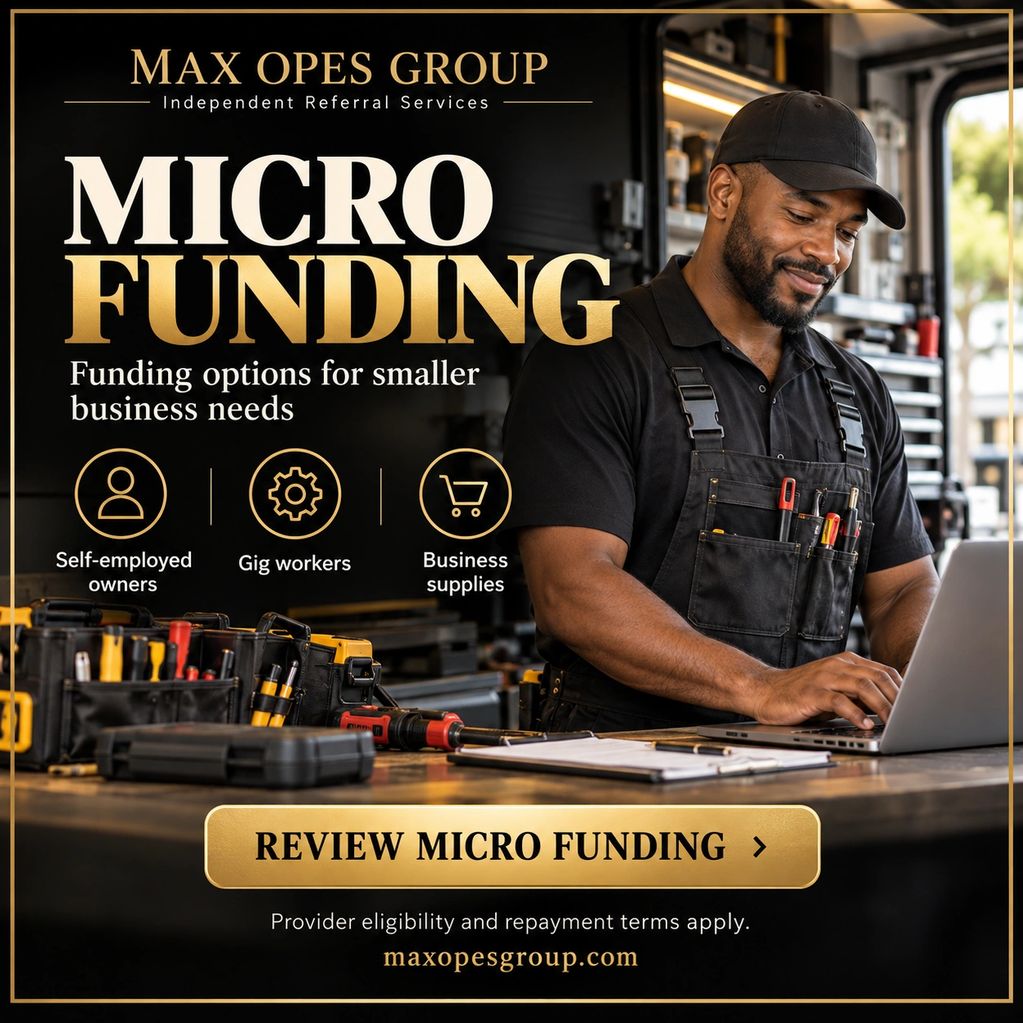 Man working on laptop promoting micro funding for small businesses.