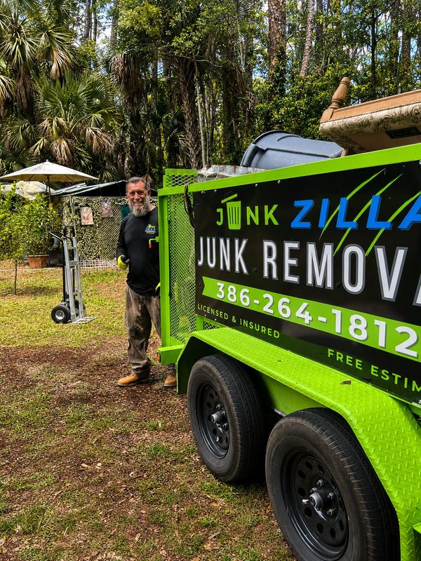 Junk Zilla trailer at a construction debris removal job in Lake Disston, Bunnell, Fl.