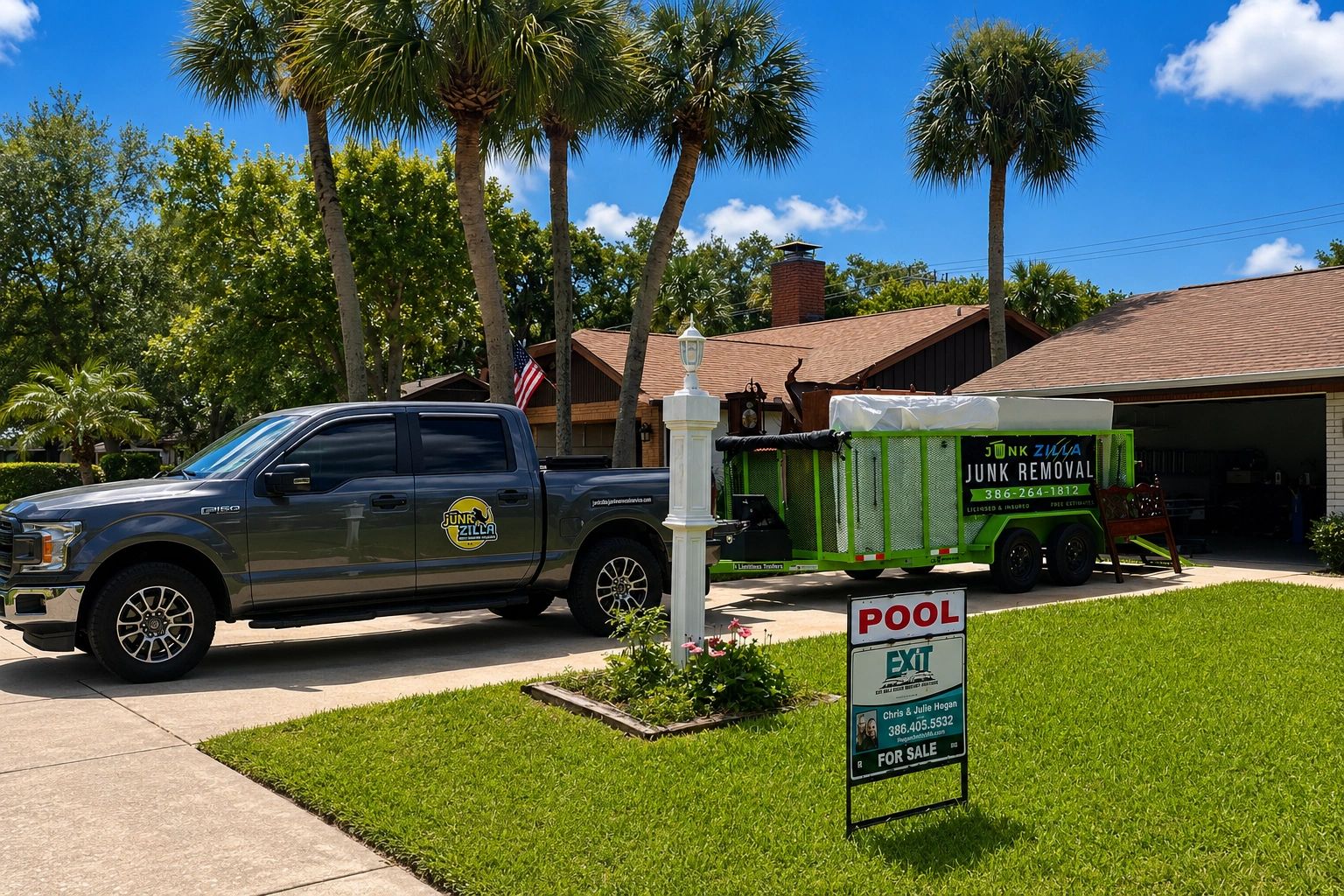Junk Zilla truck and trailer at a property cleanout in Port Orange, FL