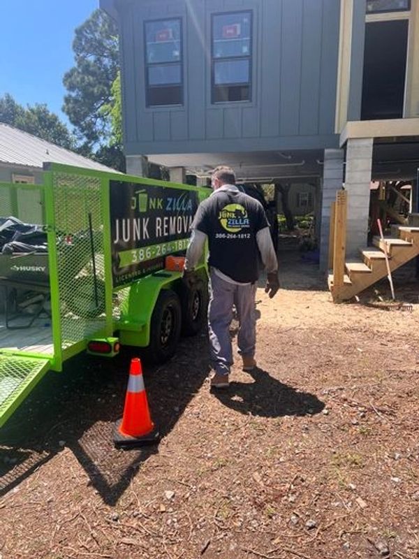 Construction debris removal at a new home in St. Augustine Beach, Fl by Junk Zilla Junk Removal.