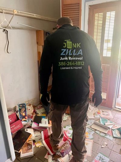 Junk Zilla team member during a foreclosure cleanout in Palatka, FL