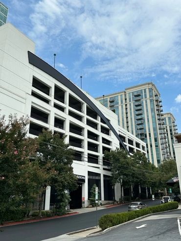 This parking deck provides ample parking for adjacent hotels, apartments and condominiums and shops