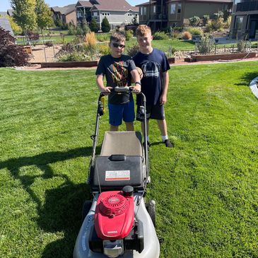 The Small Engine Flippers finishing mowing our yard.