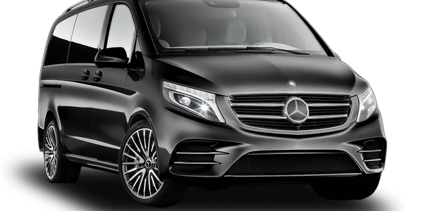 Black Mercedes-Benz luxury van with sleek design and shiny alloy wheels.