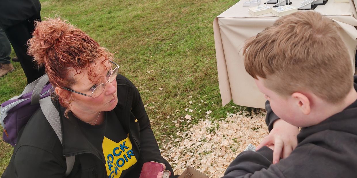 Boy and lady talking selling customer 
