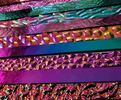 Strips  of different dichroic glass from Coatings by Sandberg pink, purple