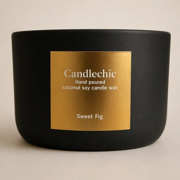 Black candle container with gold label reading Candlechic Sweet Fig.