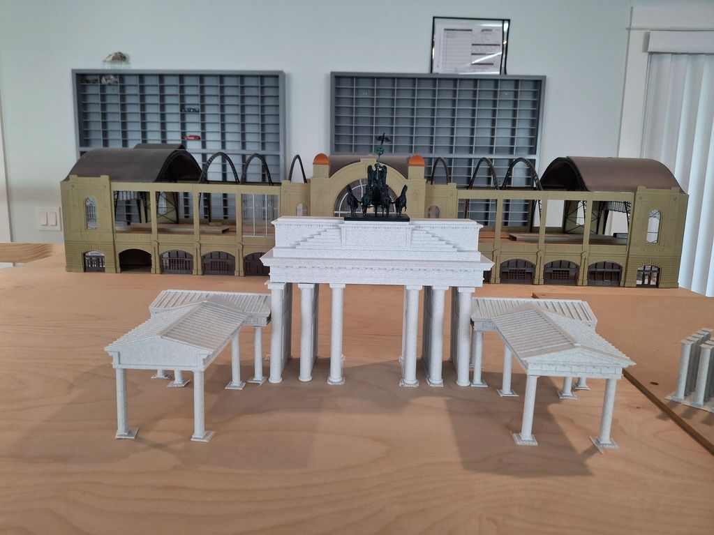 Miniature architectural models of classical structures.