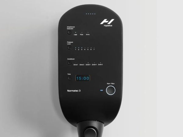 Close-up of a Hyperice Normatec 3 control panel for compression therapy.