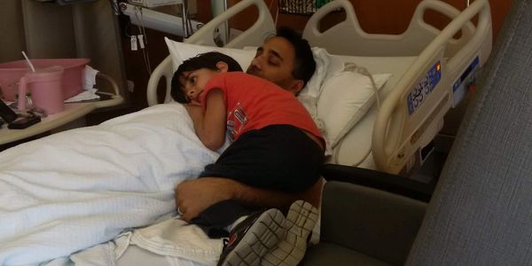 son providing comfort to daddy during kidney stones
Kidney donation