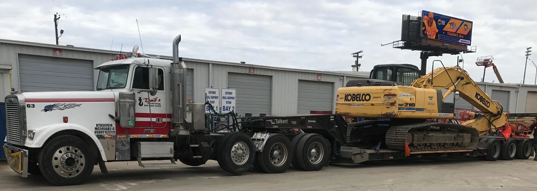 Equipment Hauling Dad's Towing Service Dad's Towing Service