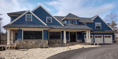 Exterior-Shingle Style Craftsman-Stone Base-Oversized Columns