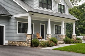 College-Exterior-Contemporary Craftsman Style-Large Overhang Roofs-Field Stone Piers