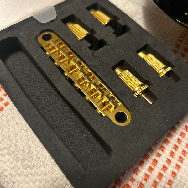 Quality maintenance and complete guitar setups including action adjustment and hardware cleaning