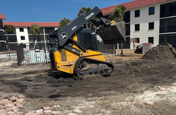 Sandal Foote Condo in Sanibel, FL Graded/leveled common area with our 325g John Deere Skid Steere