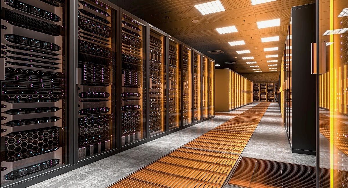 Modern data center server room with racks and yellow lighting.