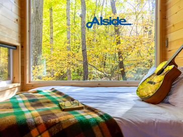 Alside white vinyl picture window.