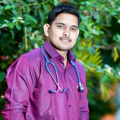 Young male doctor with stethoscope in a natural outdoor setting.