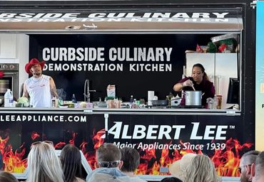 Chefs cooking at Taste of Tacoma with Chef Shawn Tibbitts