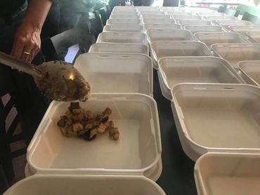 Starting to Plate Boxes of Food