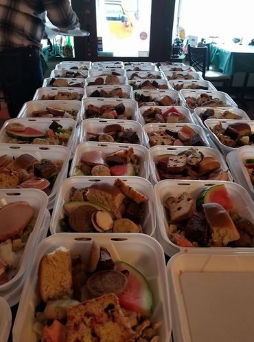 Starting to Plate Boxes of Food