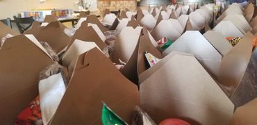 Starting to Plate Boxes of Food