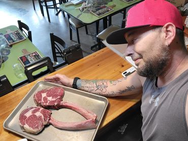 Chef Shawn Tibbitts with Tomahawk Steaks