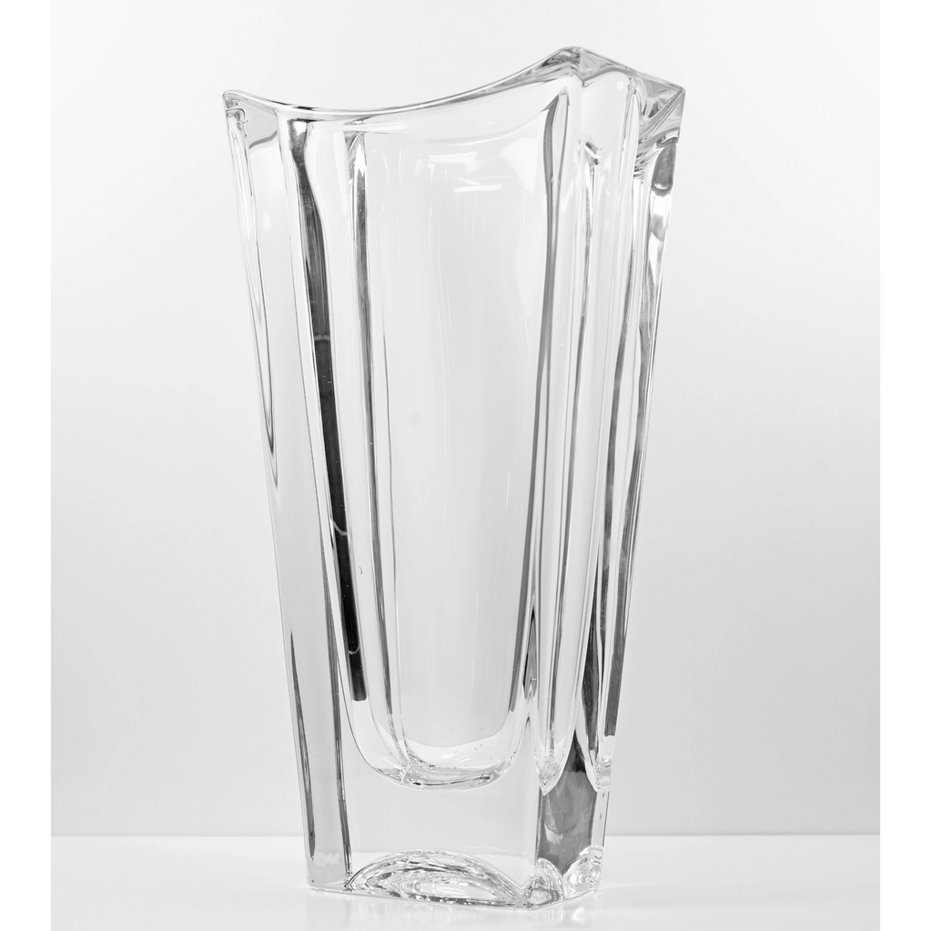 Clear glass vase with a modern, angular design.