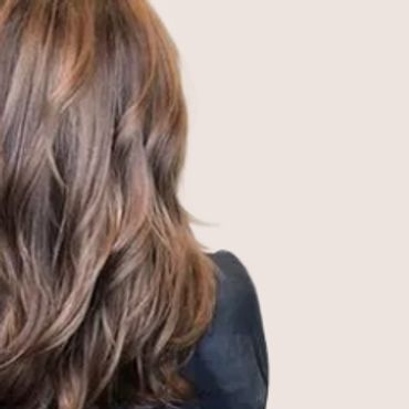 Long layered haircut/brunette highlights