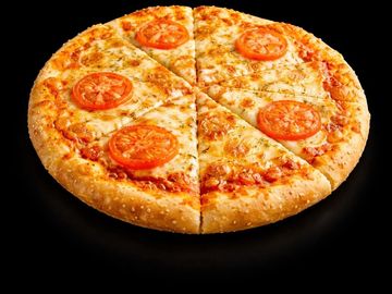Cheese pizza topped with sliced tomatoes on a black background.