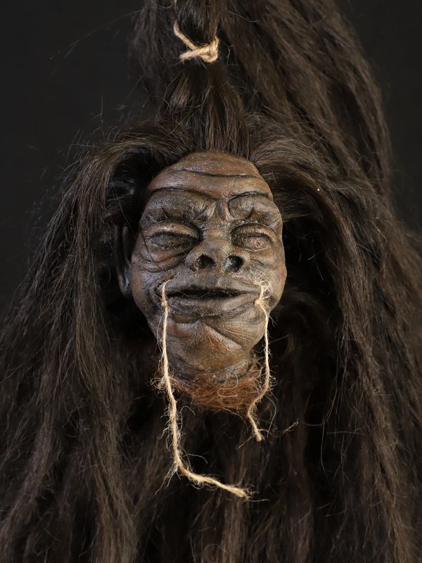 Shrunken Head: sculpted, molded, cast, painted, and hair ventilation, done by me. made with two-part