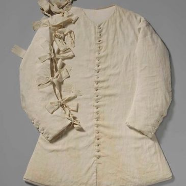 Sleeved waistcoat with bows, adapted for use by King William III of England, when he fell from his h