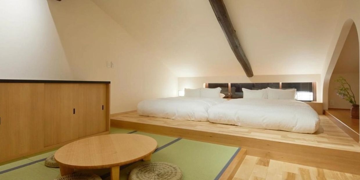 Exposed wooden ceiling beams in renovated Kyoto machiya interior
