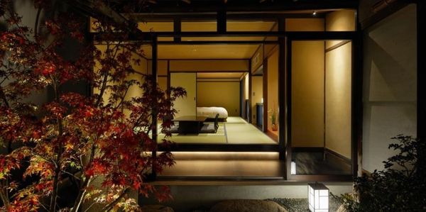 Wooden engawa veranda overlooking inner garden of a Kyoto machiya