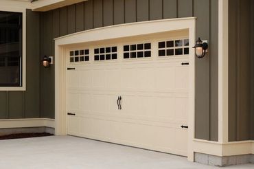 Stamped carriage house garage door