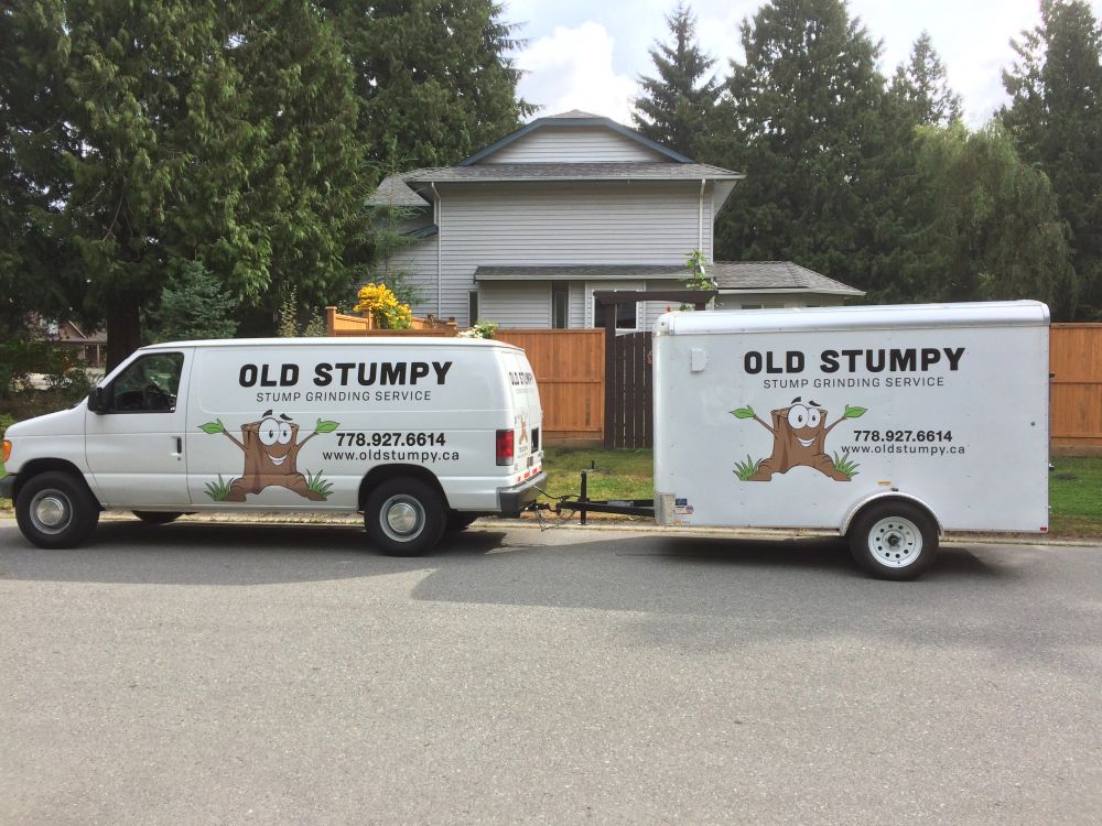 Old Stumpy van and trailer parked outside a customer's home