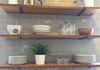 Open shelving and tile backsplash