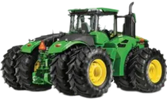 This is a green John Deere 4WD agricultural tractor. 
