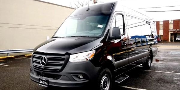 Black Mercedes-Benz Sprinter van parked and ready for luxury group transportation or executive shuttle service”