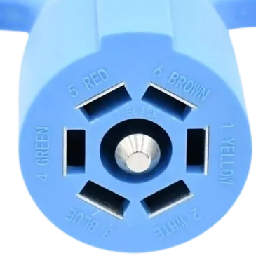 Close-up of a blue electrical connector with color-coded wire slots.