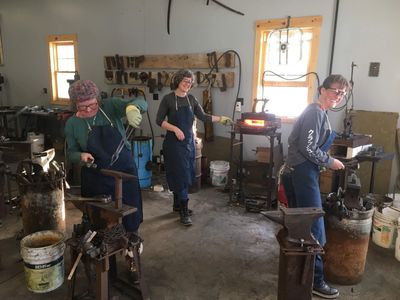 Mom and her two daughters came to learn how to blacksmith together